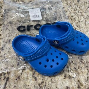 BRAND NEW- size 5 toddler Crocs